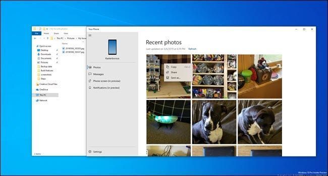 Aplikacija Vaš telefon s fotografijama pored prozora File Explorera.